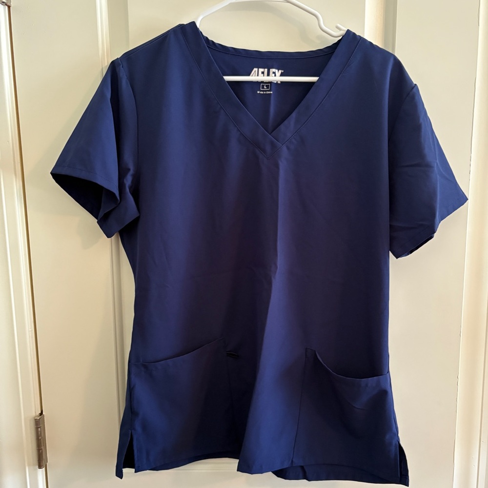 Women's Navy Blue V-Neck Scrub Top in Large. Never worn.